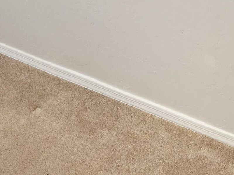 Wall restoration with texture match trim repair after photo